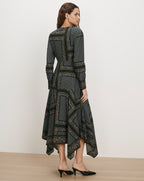 Veronica Beard Green patterned midi dress with long sleeves.