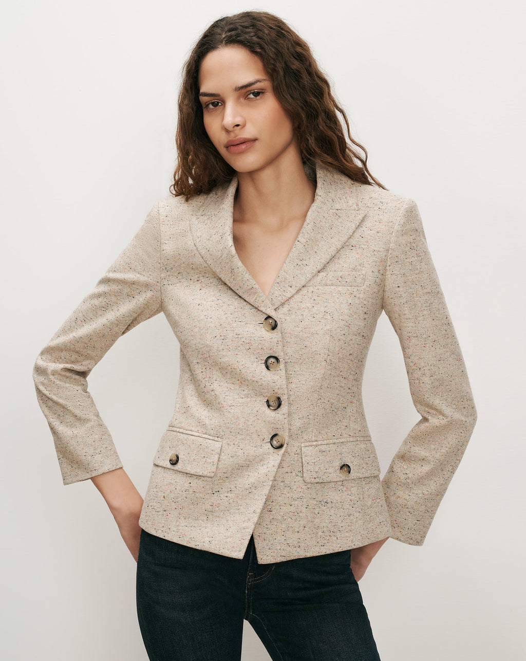 Veronica Beard Beige tweed blazer with notched lapels and flap pockets.