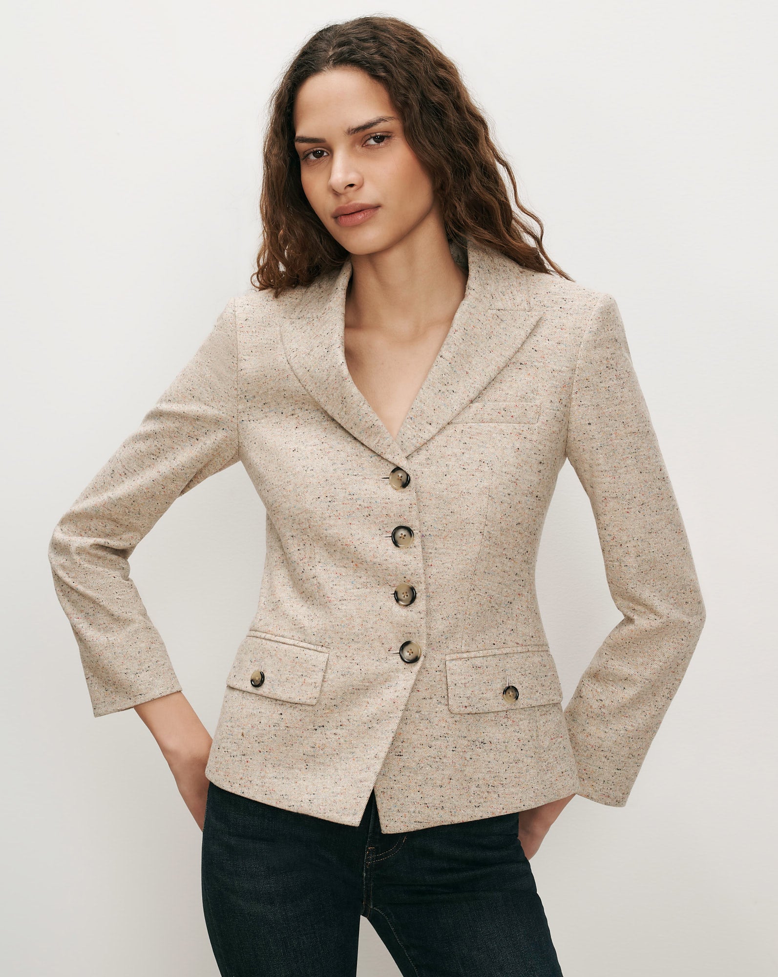 Veronica Beard Beige tweed blazer with notched lapels and flap pockets.