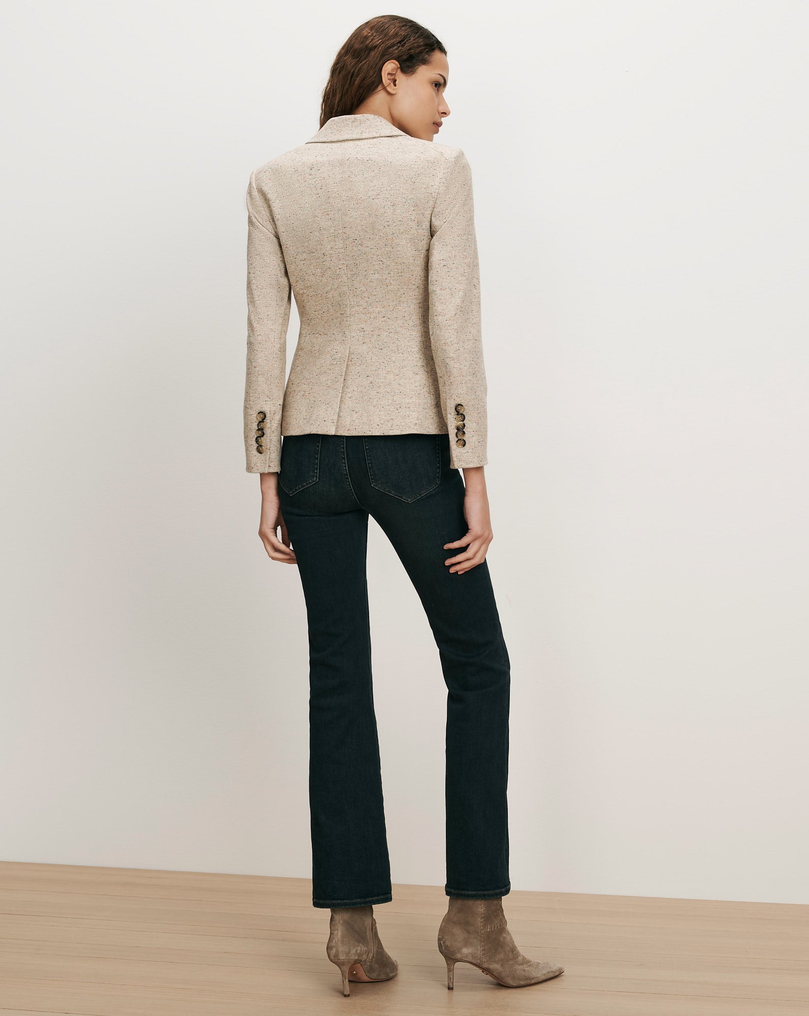 Veronica Beard Beige tweed blazer, dark wash jeans, brown suede boots.