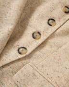 Veronica Beard Beige tweed blazer with colorful flecks and brown buttons.