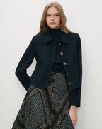 Veronica Beard Navy blue jacket with gold buttons.