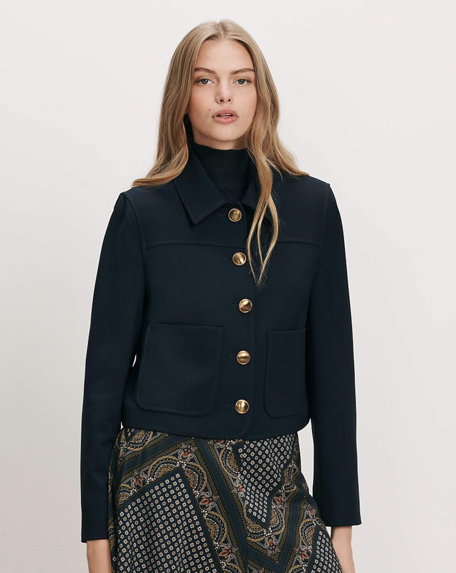 Veronica Beard Dark blue cropped jacket with gold buttons.