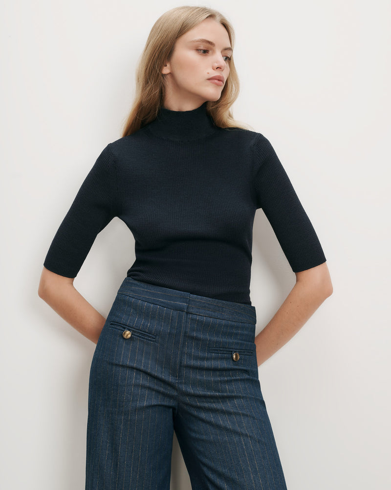 Veronica Beard Black ribbed turtleneck, blue pinstripe wide-leg pants