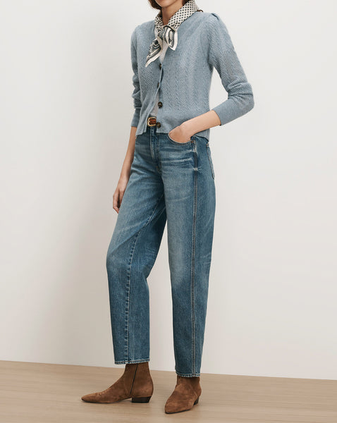 Veronica Beard Blue cable knit cardigan, jeans, brown suede boots.