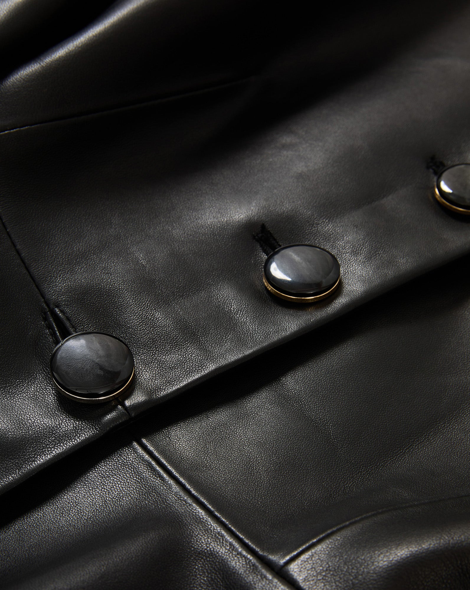 Veronica Beard Black leather jacket with three buttons.
