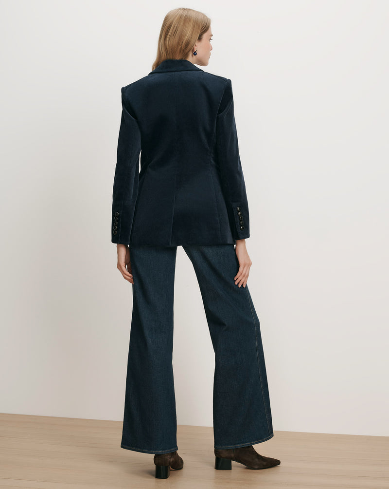 Veronica Beard Navy corduroy blazer and wide-leg jeans.