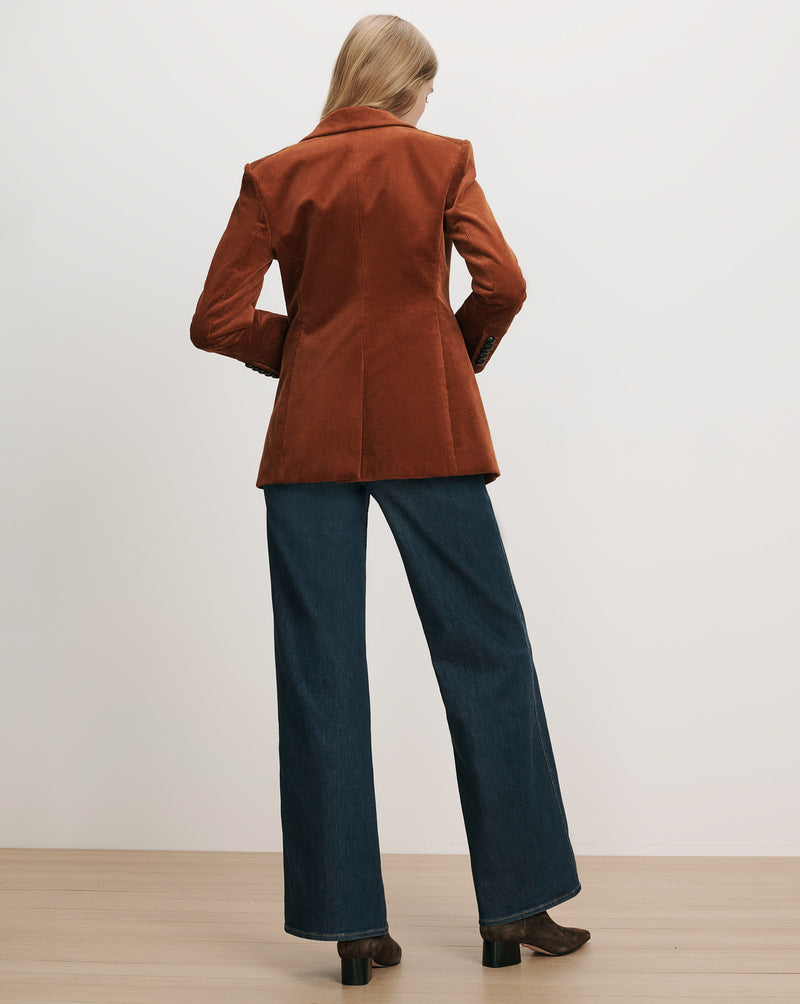 Veronica Beard Brown corduroy blazer, dark wash wide-leg jeans.