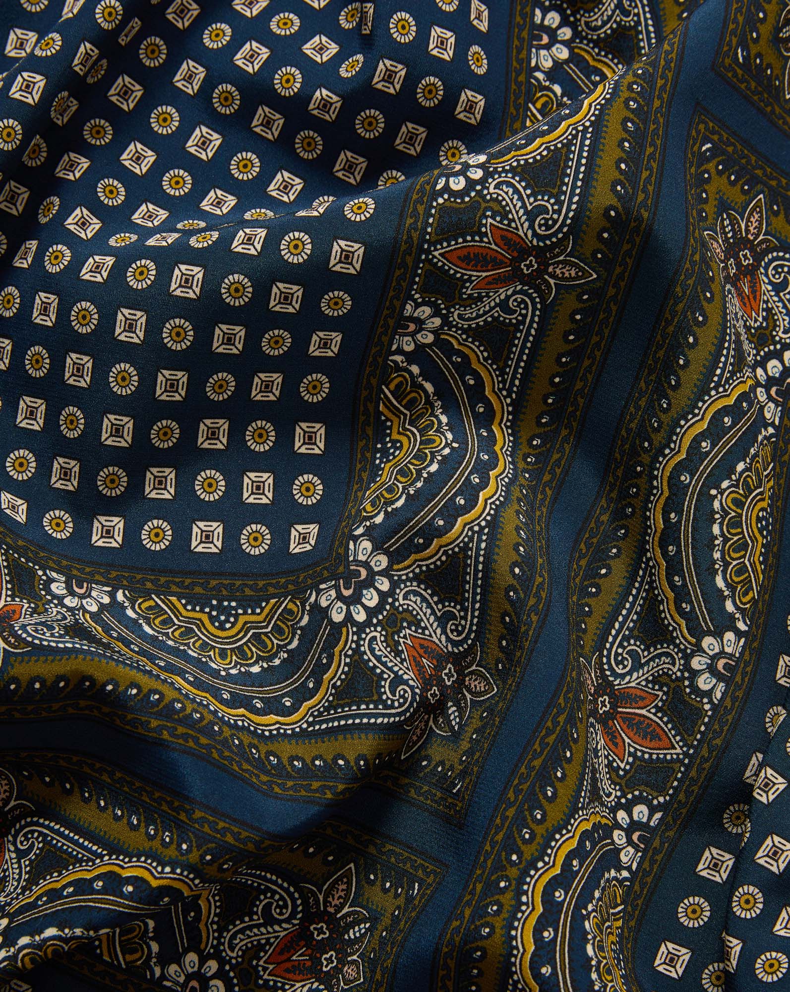 Veronica Beard Blue silk bandana with a yellow and white paisley pattern.