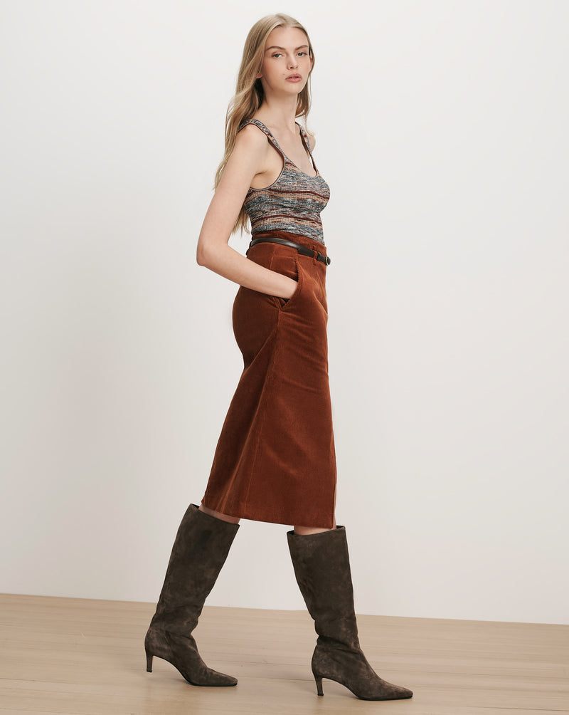 Veronica Beard Brown corduroy midi skirt with a black belt.