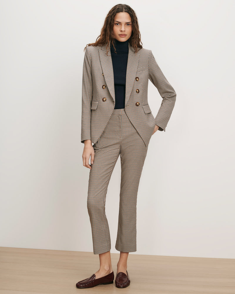 Veronica Beard Brown houndstooth suit with double-breasted blazer and cropped pants.