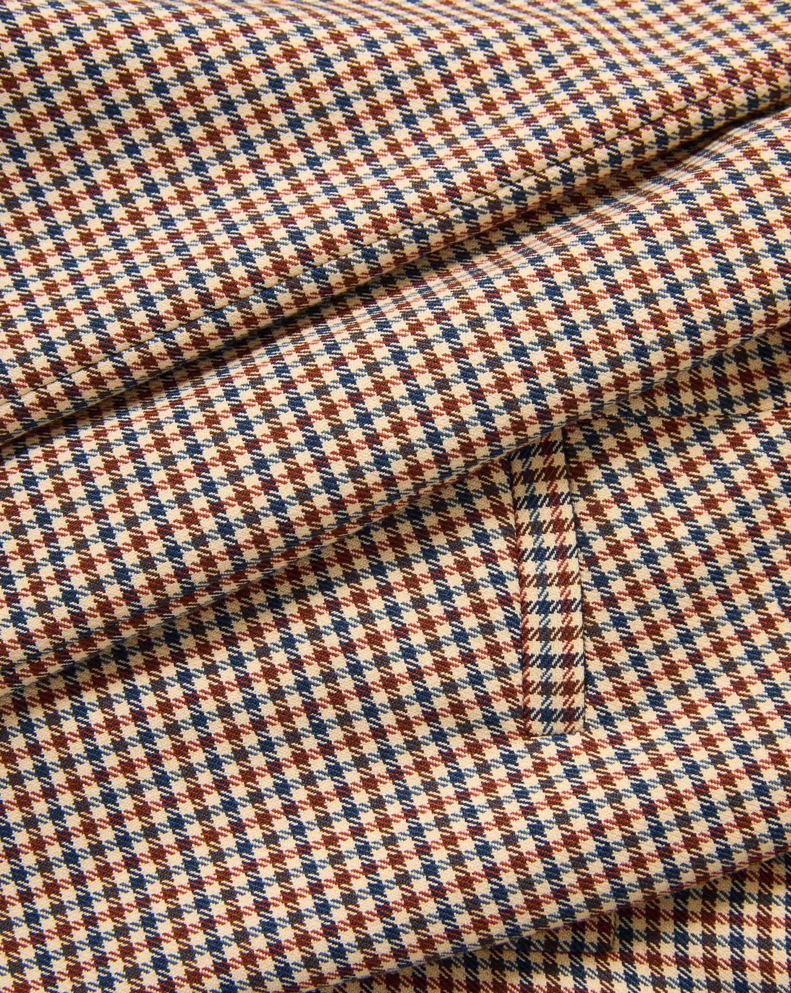 Veronica Beard Brown, blue, and beige houndstooth fabric.
