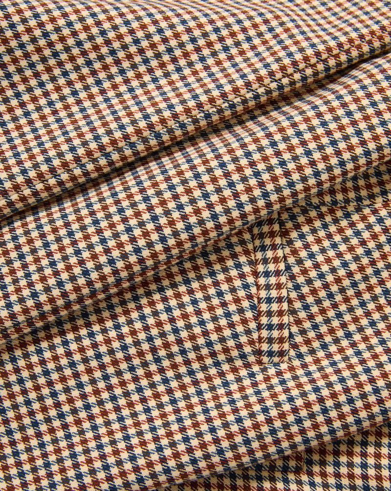 Veronica Beard Brown, blue, and beige houndstooth fabric.