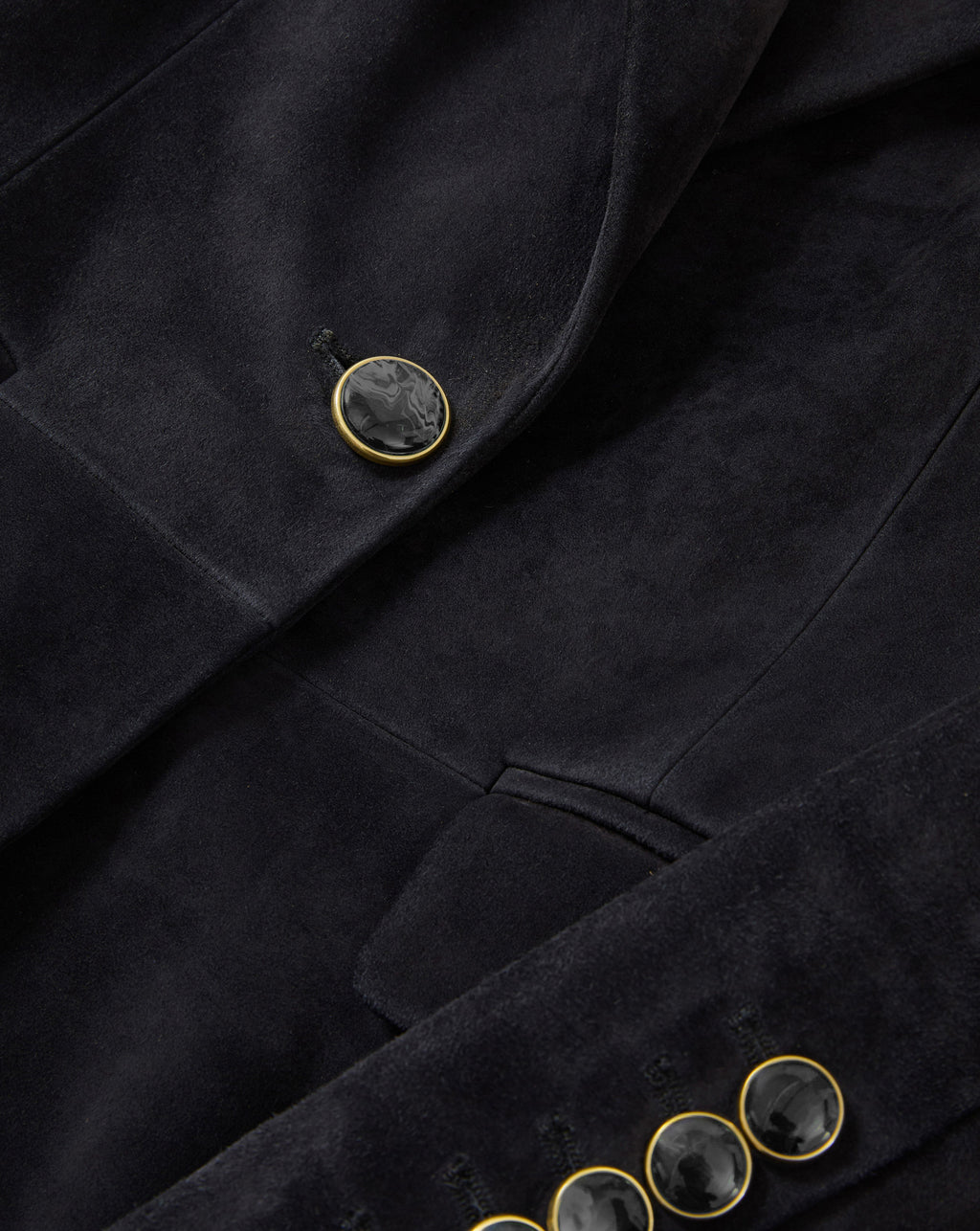 Veronica Beard Black suede blazer with gold and black buttons.