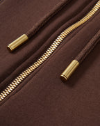 Veronica Beard Brown hoodie with gold zipper and drawstrings.