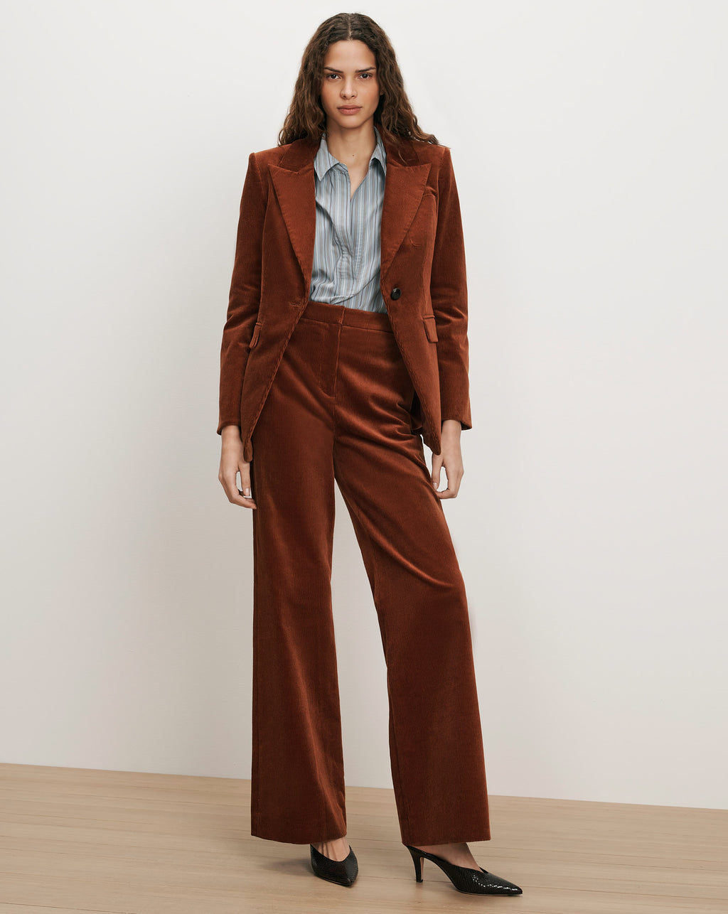 Veronica Beard Brown corduroy suit with striped shirt.