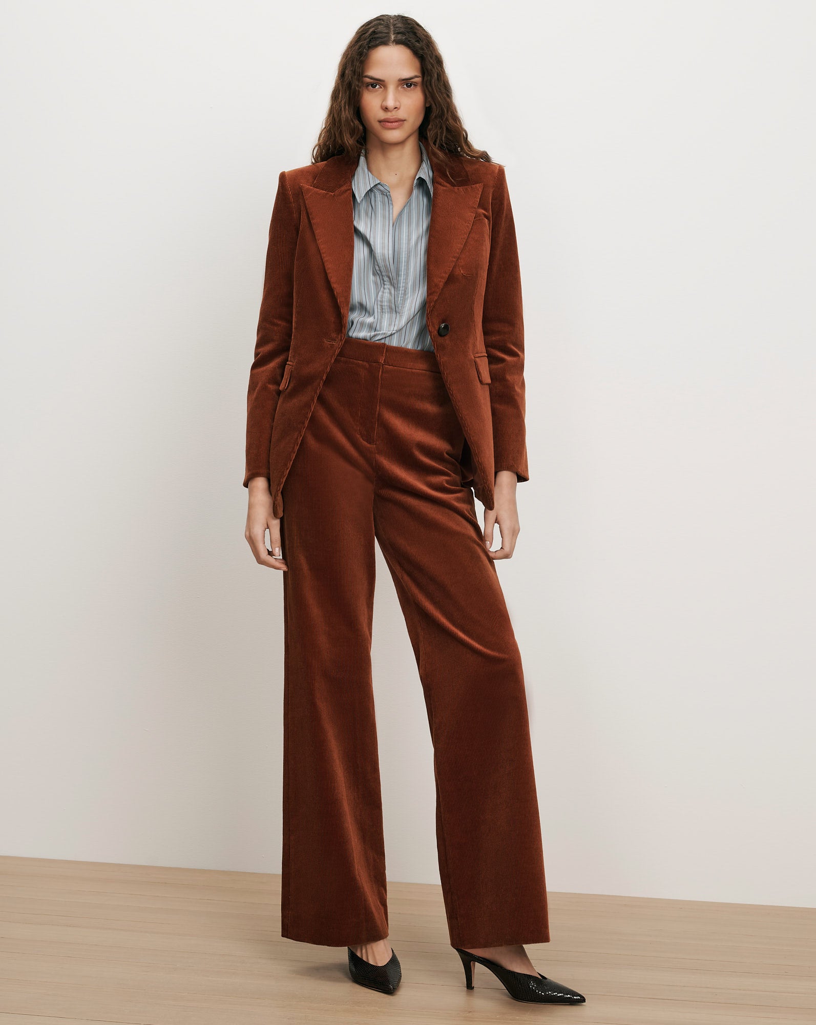 Veronica Beard Brown corduroy suit with striped shirt.