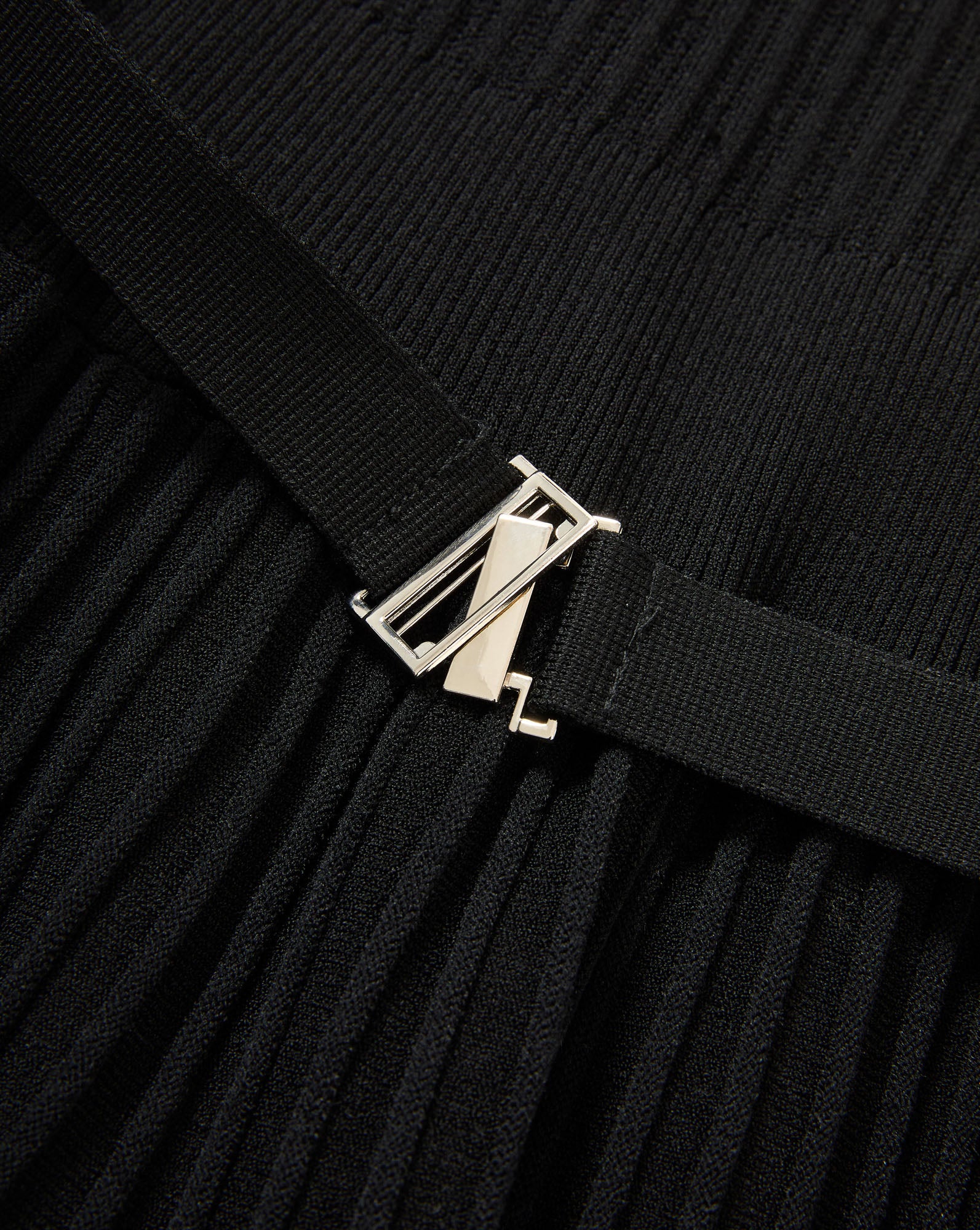 Veronica Beard Black pleated knit skirt with silver buckle.