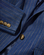 Veronica Beard Blue pinstripe blazer with gold buttons.