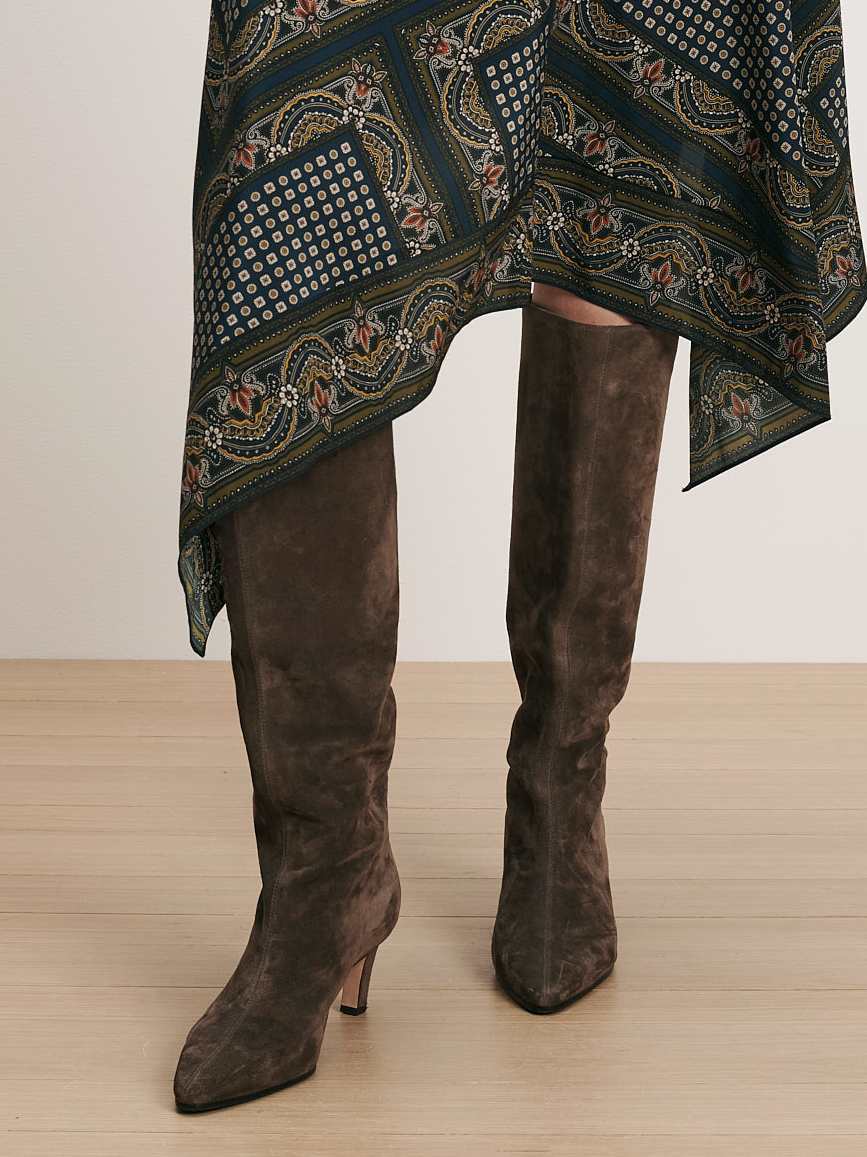 Veronica Beard Brown suede knee-high boot with kitten heel.