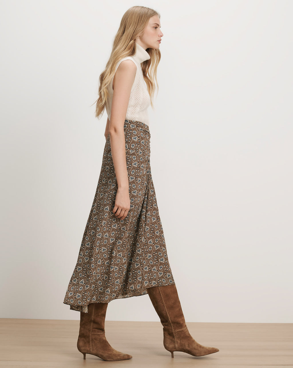Veronica Beard Brown floral midi skirt and white sleeveless turtleneck.