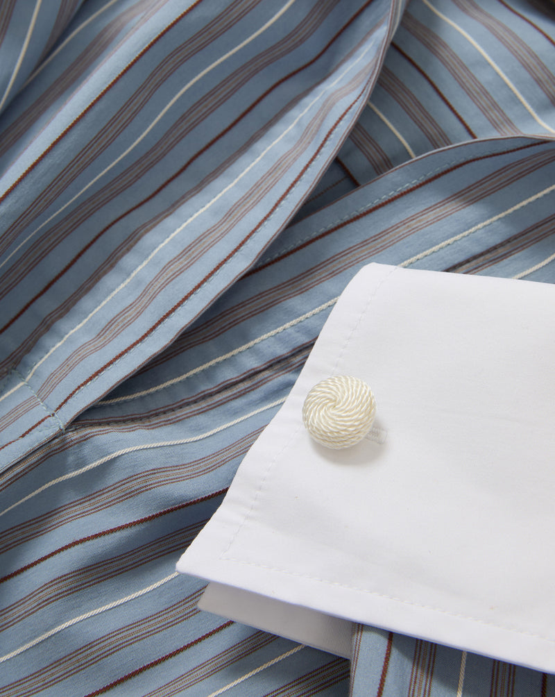 Veronica Beard Blue striped dress shirt with white cuff and cufflink.