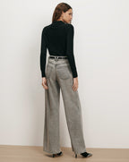 Veronica Beard Black ribbed turtleneck, gray wide-leg jeans