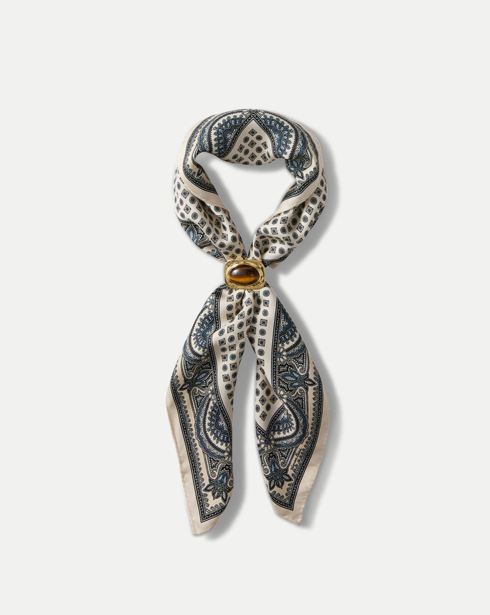Veronica Beard Cream and blue patterned silk scarf with a brown stone ring.