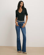 Veronica Beard Black fitted V-neck tee and flare jeans.