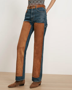 Veronica Beard Blue denim jeans with brown suede chaps.