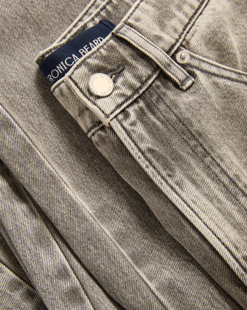 Veronica Beard Washed gray denim jeans with a button closure.