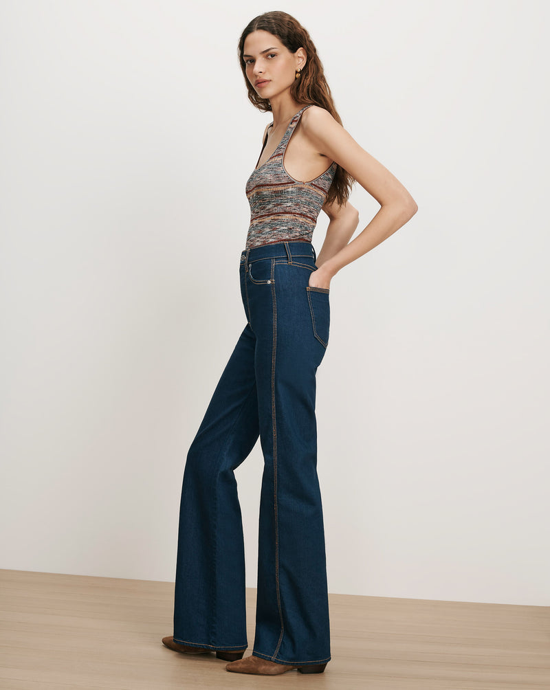 Veronica Beard Blue denim flared jeans with contrast stitching.