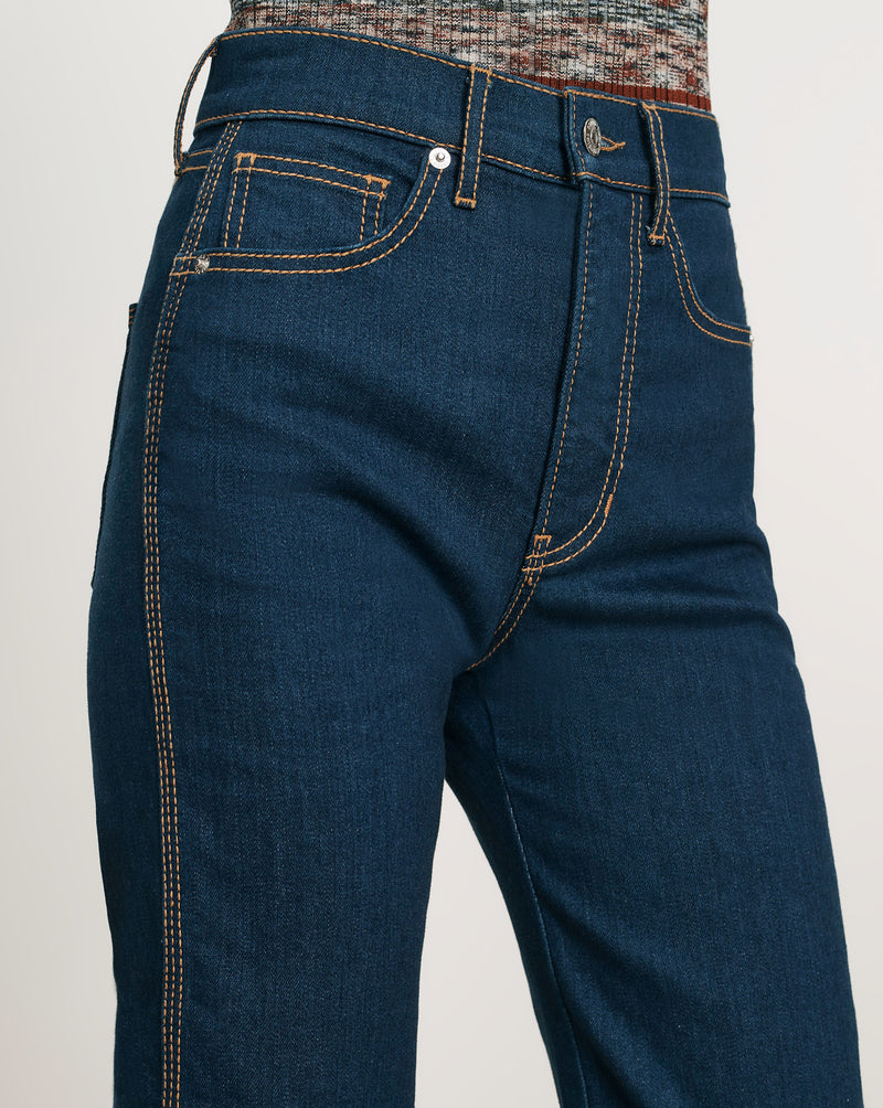 Veronica Beard Blue denim jeans with orange stitching.