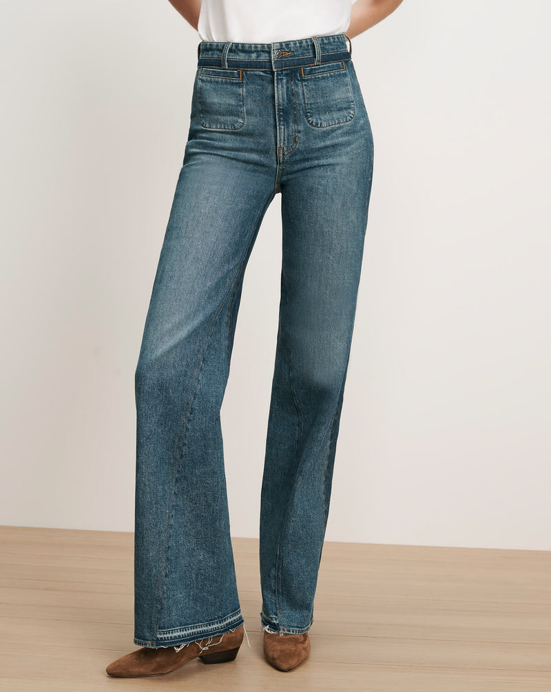 Veronica Beard Blue denim wide-leg jeans with front patch pockets.