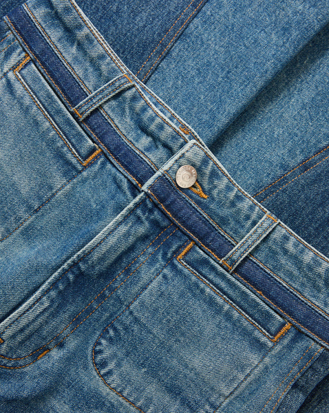 Veronica Beard Blue denim jeans with contrasting dark blue stripe.