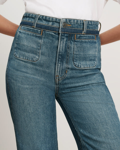 Veronica Beard Blue denim jeans with front patch pockets.