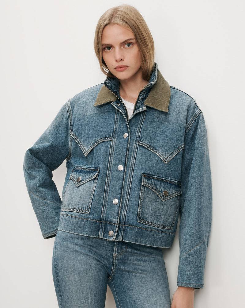 Veronica Beard Blue denim jacket with green corduroy collar.