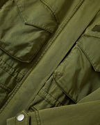 Veronica Beard Olive green cotton utility jacket with flap pockets.