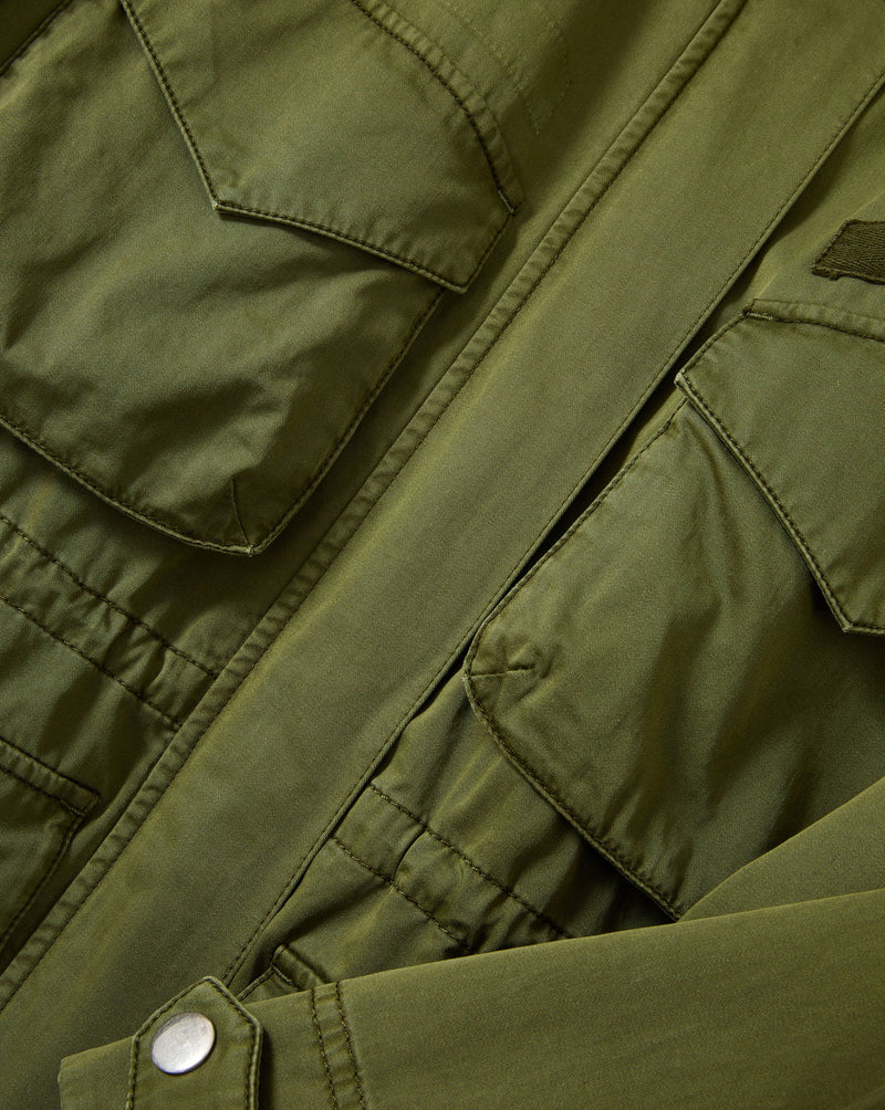 Veronica Beard Olive green cotton utility jacket with flap pockets.
