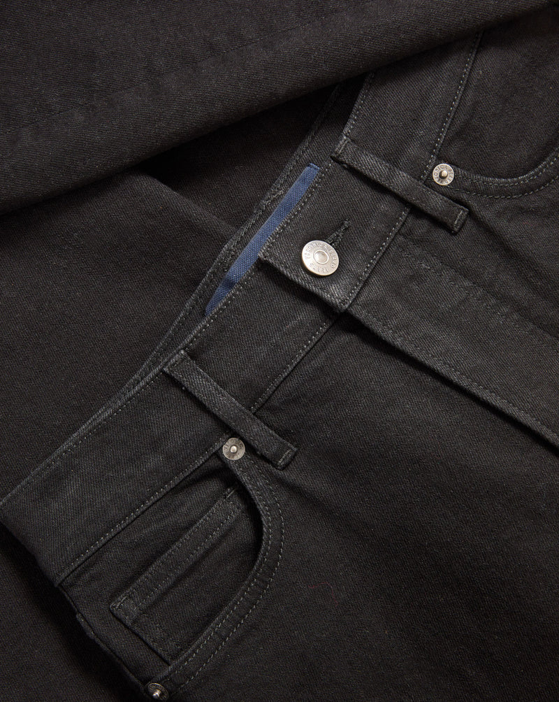 Veronica Beard Black denim jeans with silver button and rivets.