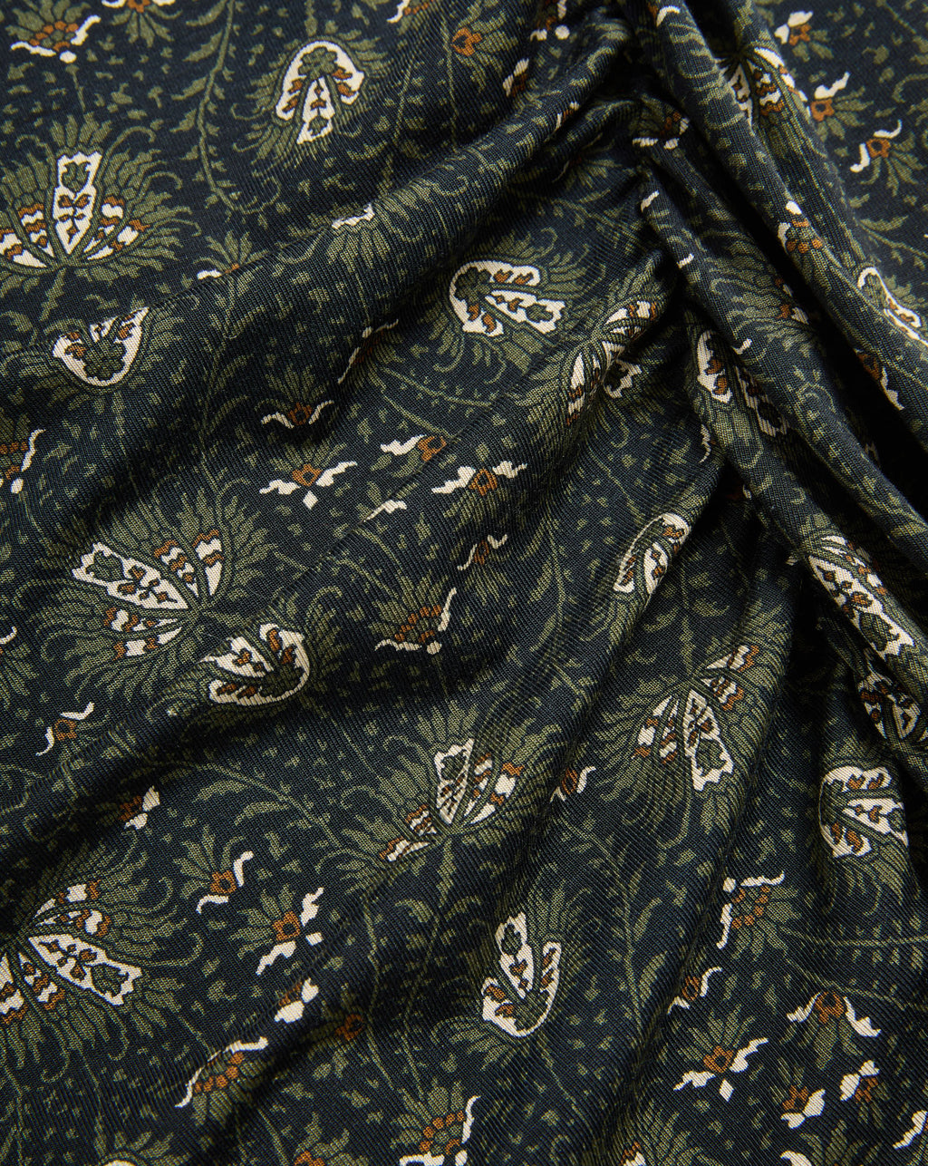 Veronica Beard Dark green patterned fabric with white and olive paisley.