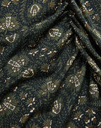 Veronica Beard Dark green patterned fabric with white and olive paisley.