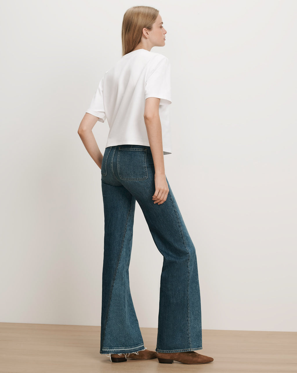Veronica Beard White t-shirt, blue flared jeans