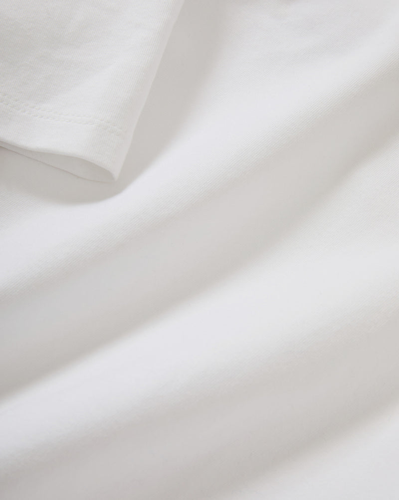 Veronica Beard White cotton t-shirt, close-up of fabric texture.