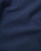 Veronica Beard Navy blue fabric with subtle folds.