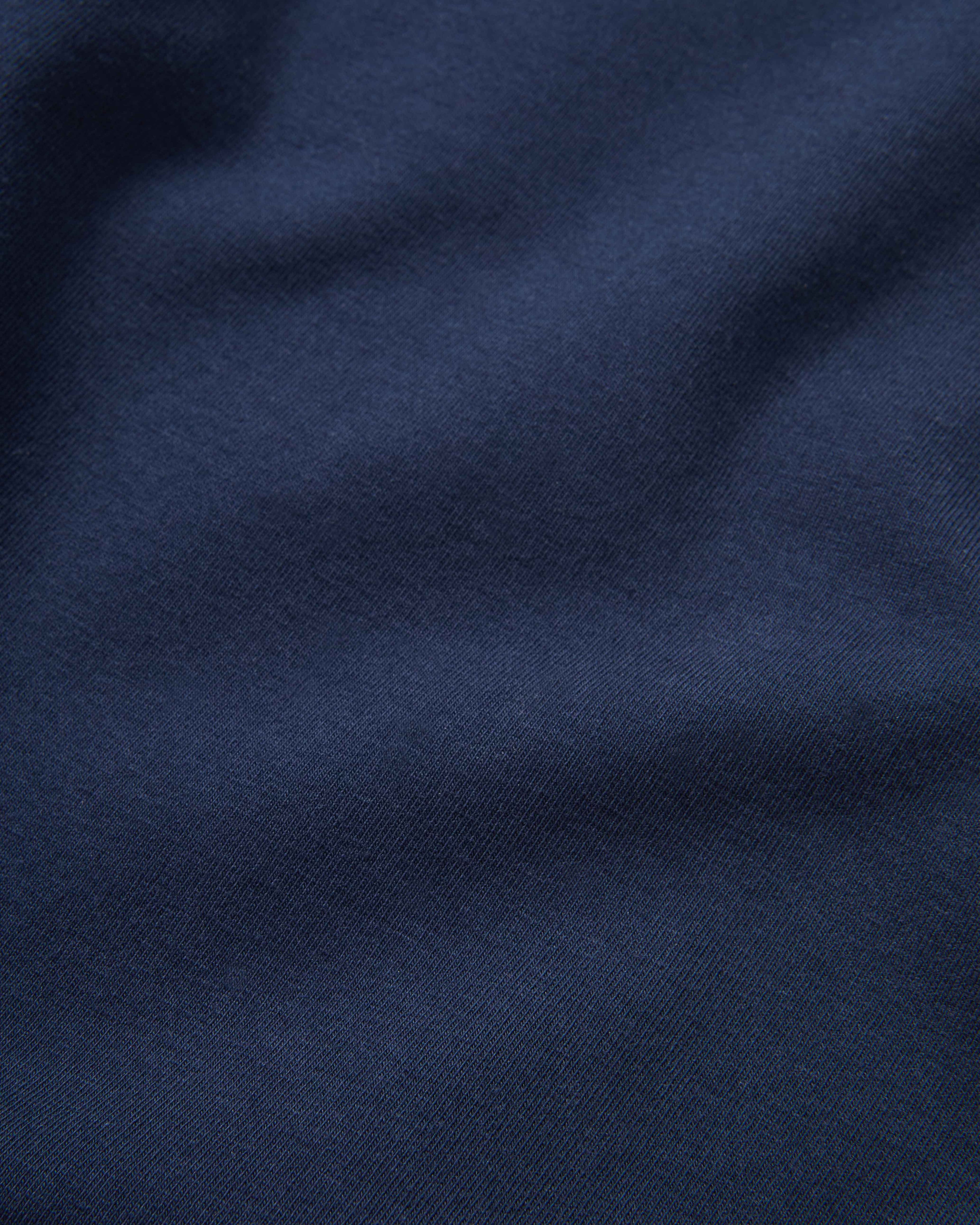Veronica Beard Navy blue fabric with subtle folds.