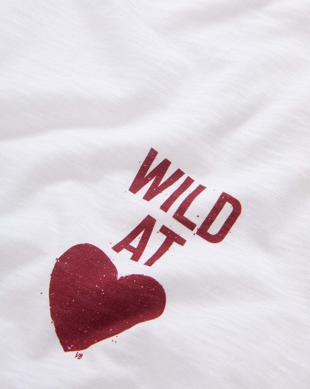 Veronica Beard White t-shirt with red heart graphic text.