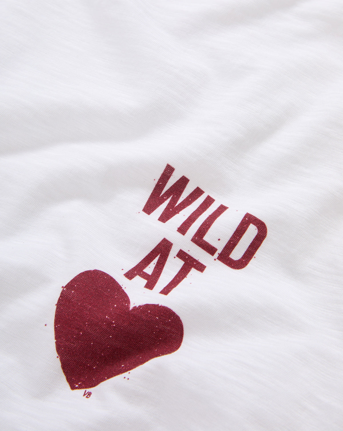 Veronica Beard White t-shirt with red heart graphic text.