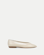Veronica Beard Cream patent leather ballet flats with pointed toe.