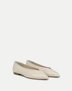Veronica Beard Cream leather pointed-toe ballet flats with a V-cut vamp.